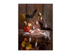 Halloween decorations with ghost lights, bats, and autumn leaves on wooden crates.