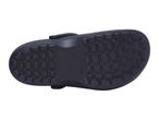 Bottom view of a dark blue clog with a textured sole.
