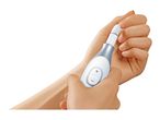 A person using an electric nail polisher on their fingernails.