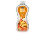 Mistura para panquecas Belbake Free From sem glúten com sabor a caramelo numa garrafa de 200g.