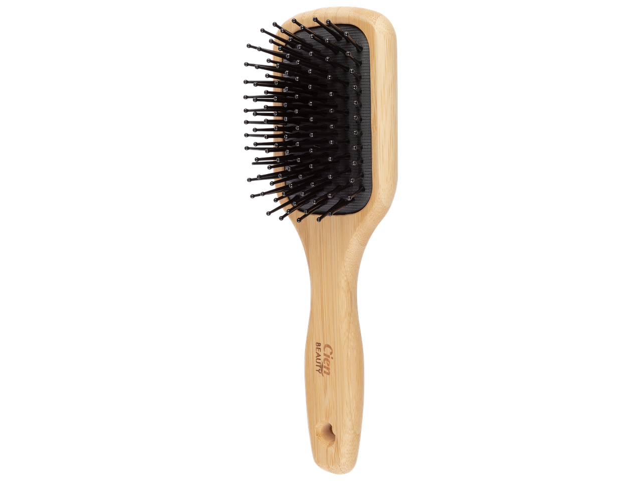 Brosse à cheveux en bois avec des picots noirs, le manche porte l'inscription 'Beauty'.