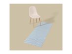 A white chair with wooden legs on a beige floor, next to a blue and white checkered mat.