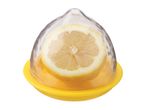 A yellow silicone lemon saver keeps a lemon half fresh.