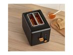 Black toaster with toast, jam, and a wooden cutting board on a wooden counter.