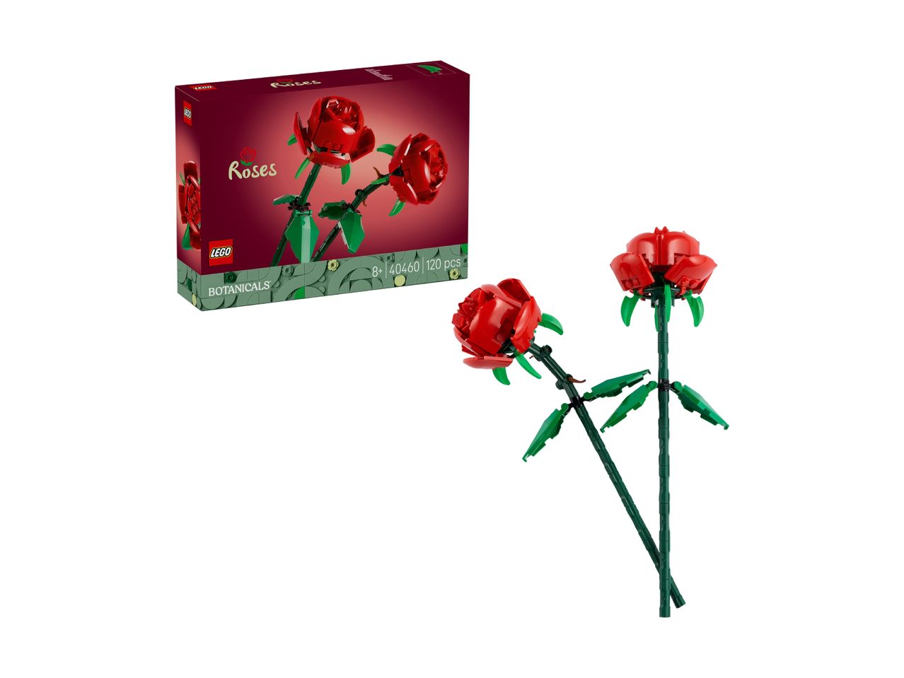 Two red rose flower models made from building blocks, with their box in the background.