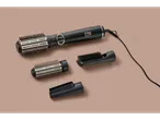 Cien BEAUTY Rotating Hot Air Styling Brush with multiple attachments on a beige background.