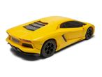 Yellow toy sports car with black wheels and tinted windows, viewed from the rear at an angle.