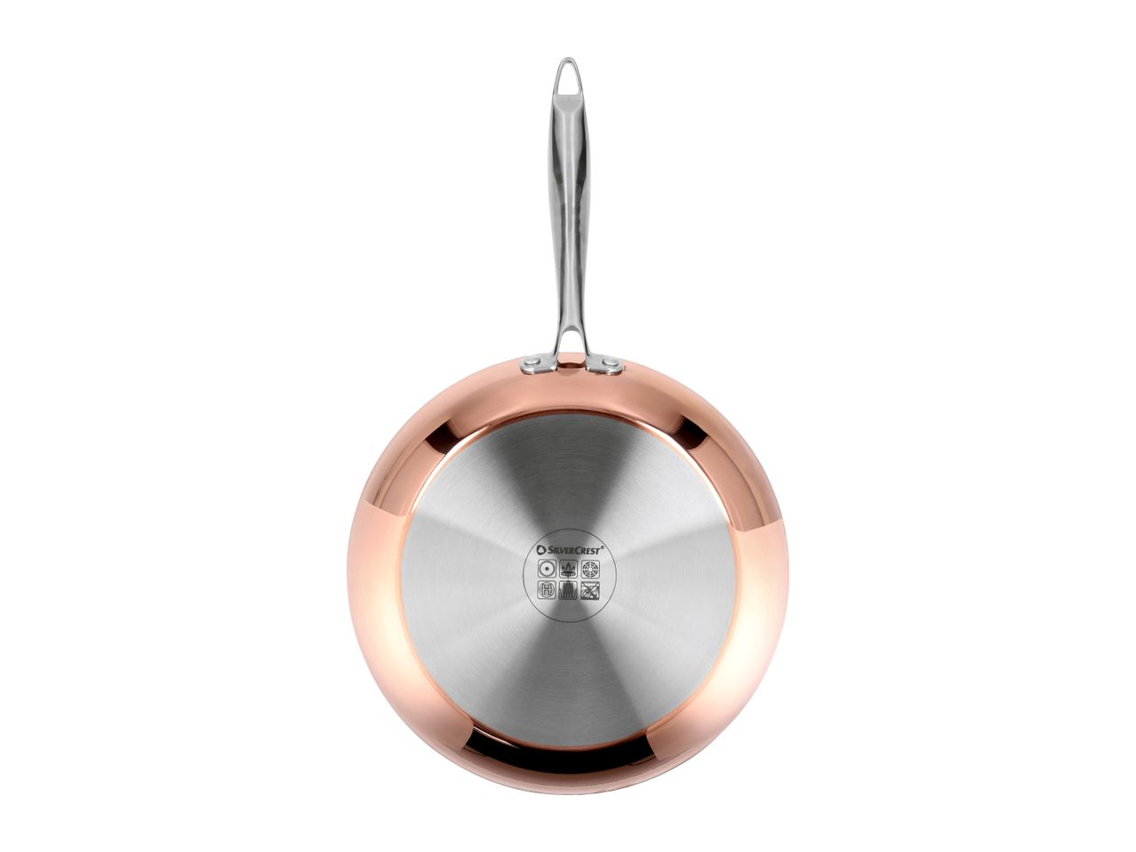 Underside of a copper-colored frying pan with a silver induction base and stainless steel handle