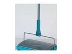 Close-up of a teal and gray push broom with a long handle.