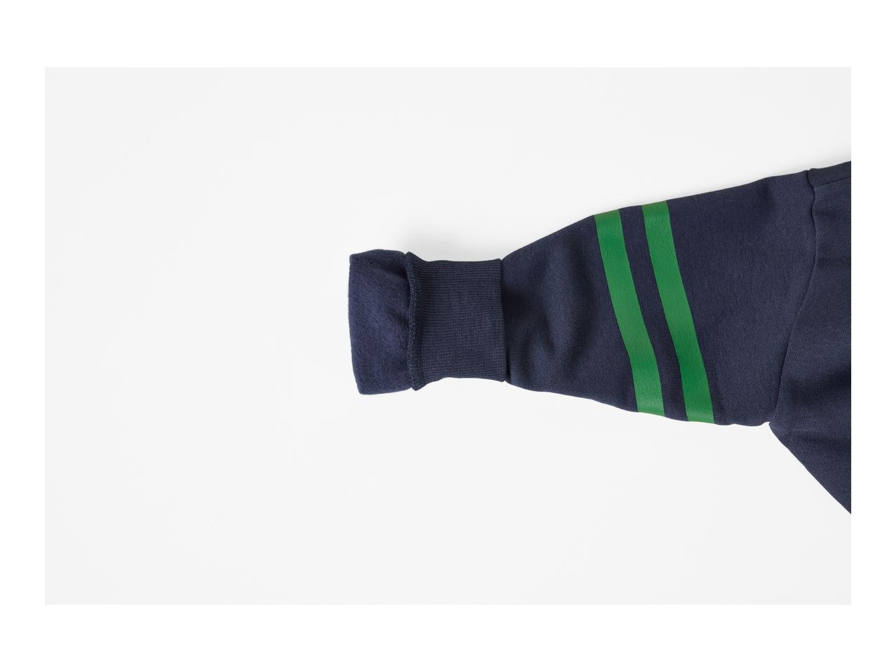 Navy blue long-sleeve shirt with green stripes on the arm.