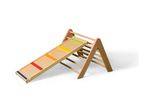 Wooden climbing frame with a colorful slide attachment on a white background.