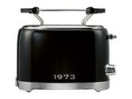 Black retro toaster with integrated warming rack and the year 1973 on the front