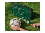 PARKSIDE air compressor inflating a football on green grass.