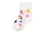 White sock with colorful embroidered flowers, sun, and rainbow designs