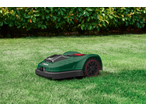 PARKSIDE® 20V Robot Lawn Mower on green grass with a hedge in the background.