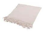 Light pink knitted blanket with decorative fringe