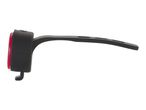 Side view of a black bike rear light with a red lens.