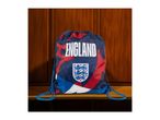 England drawstring bag with a crest and text, set against a wooden background.