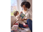 Mother and baby playing with soft toys.