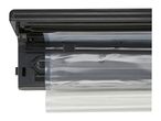 Close-up of a vacuum sealer with a plastic roll and integrated cutter