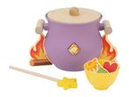 Purple toy cauldron with wooden lid, handles, and fire cutouts, with a yellow bowl of play ingredients and a star-tipped wand.