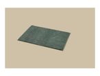 Rectangular dark green bath mat on a light beige background.
