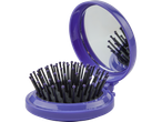 Uma escova de cabelo roxa com espelho.