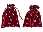 Du aksominiai raudoni dovanų maišeliai su amalo raštu