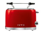Red retro-style toaster with a bun warmer attachment and the year 1973 on the front
