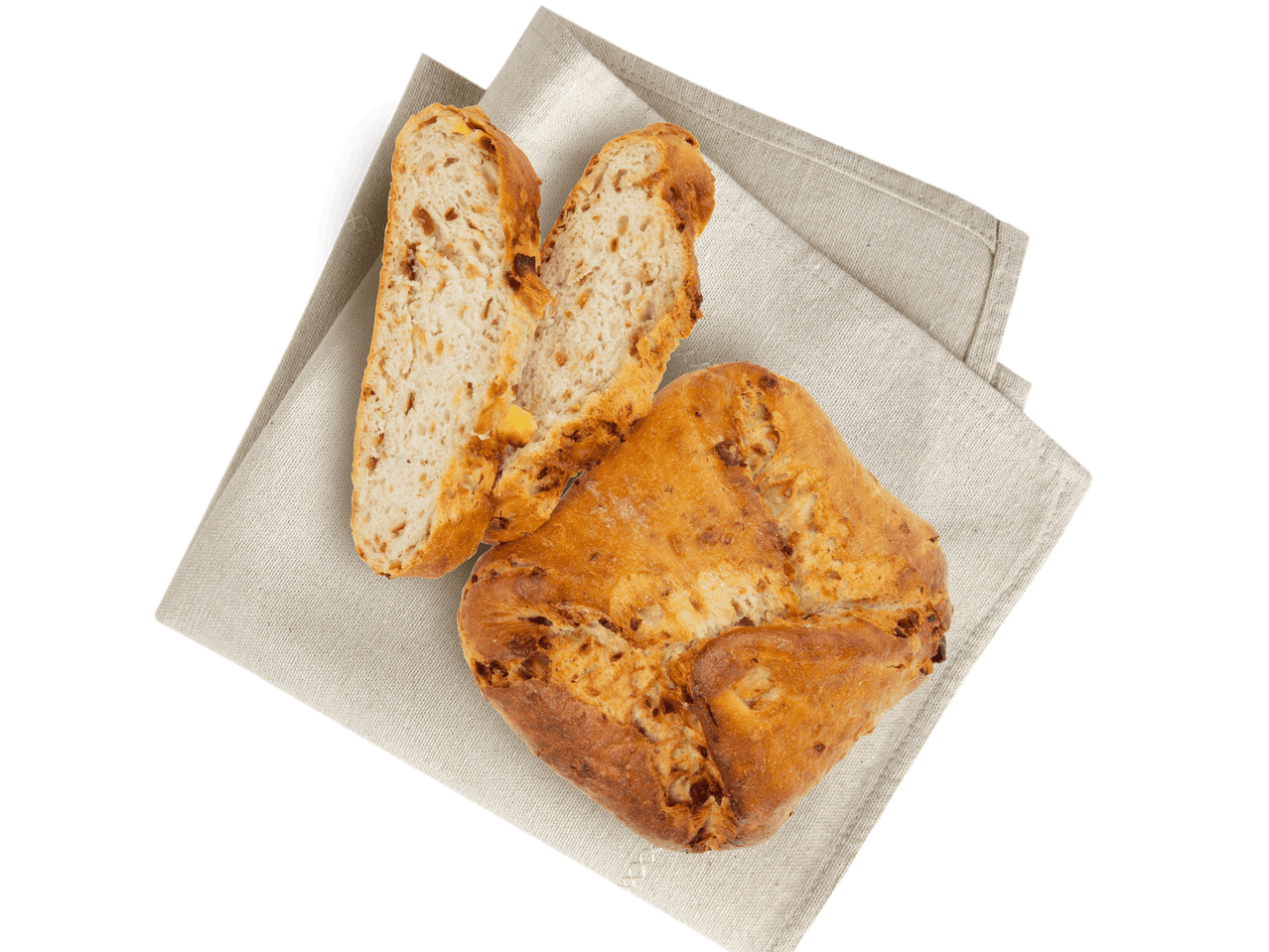 Kräuterbrot und Brötchen auf einem Leinen-Tuch.