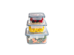 SILVERCREST® Glass Food Storage Containers stacked with berries, bell peppers, and salad.