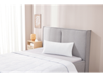 Duvet and pillow on a modern bed.