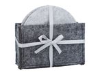 Set of light grey felt coasters in a dark grey felt holder tied with a ribbon