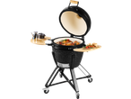 Grillmeister Ceramic Barbecue with food cooking inside and side tables with ingredients.