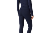 Woman in dark blue long-sleeved top and matching leggings, rear view