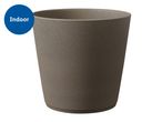 Brown indoor plant pot with a textured surface.