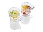 Two double-walled glass mugs with handles, containing refreshing fruit-infused drinks.