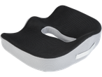 A gray and black mesh coccyx cushion with a cutout for pressure relief.