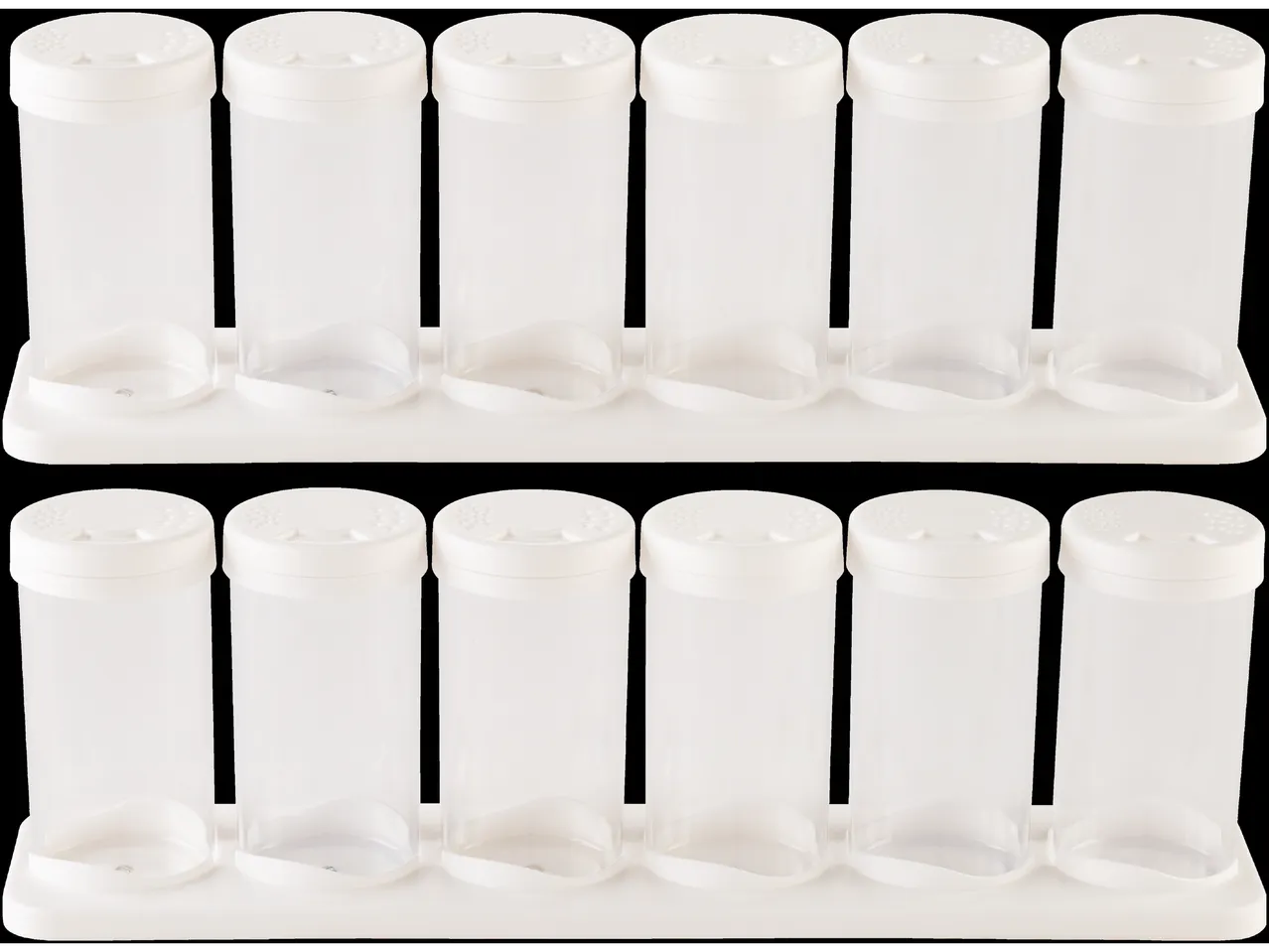 Two rows of white plastic spice jars with shaker tops sit in a white rack.