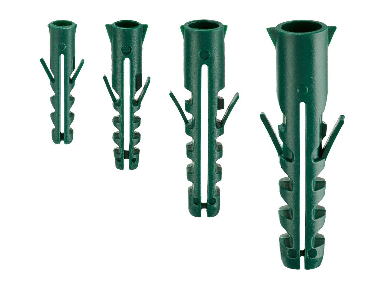 Four green plastic wall plugs of varying sizes, arranged diagonally.