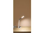 LIVARNO HOME LED-Tischleuchte mit Telefonladefunktion auf einem Holzschreibtisch