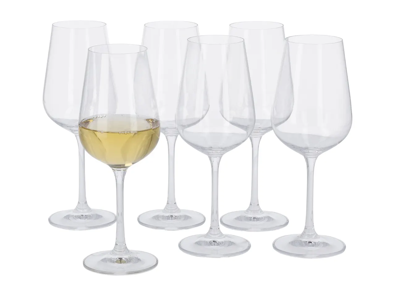 Six clear stemmed wine glasses, one filled with white wine, on a white background.