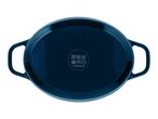 Dark blue oval baking dish with handles, showing the bottom with cooking compatibility symbols.