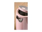 Close-up of a pink kettle with a partially open lid on a wooden surface.