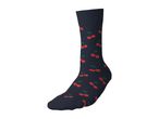 Dark blue sock with a red cherry pattern