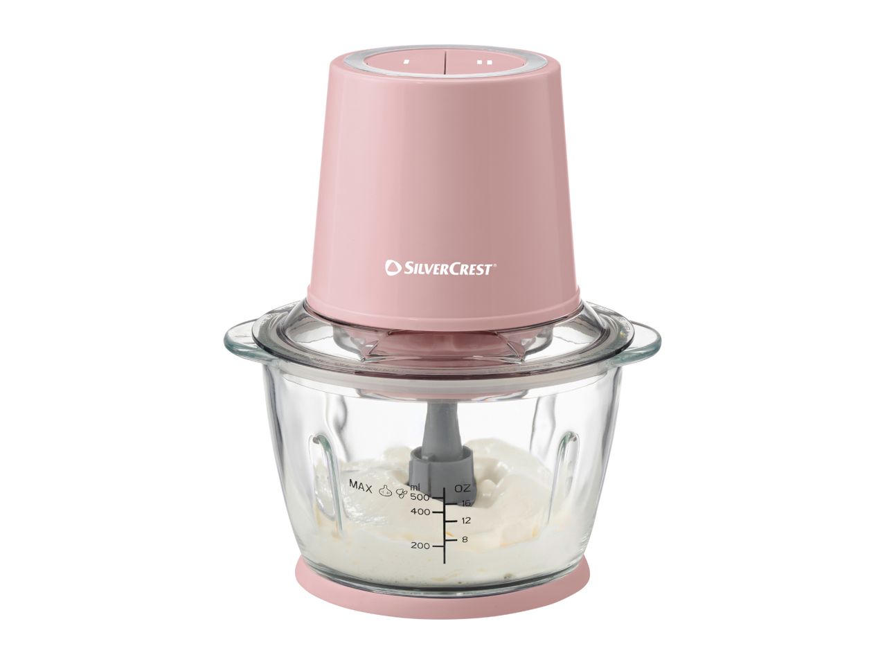Pink food chopper with a glass bowl containing a white substance.