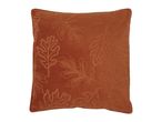 Orange cushion with embroidered leaf patterns