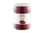 Glass jar of beetroot with onion, featuring a colorful folk-art label.