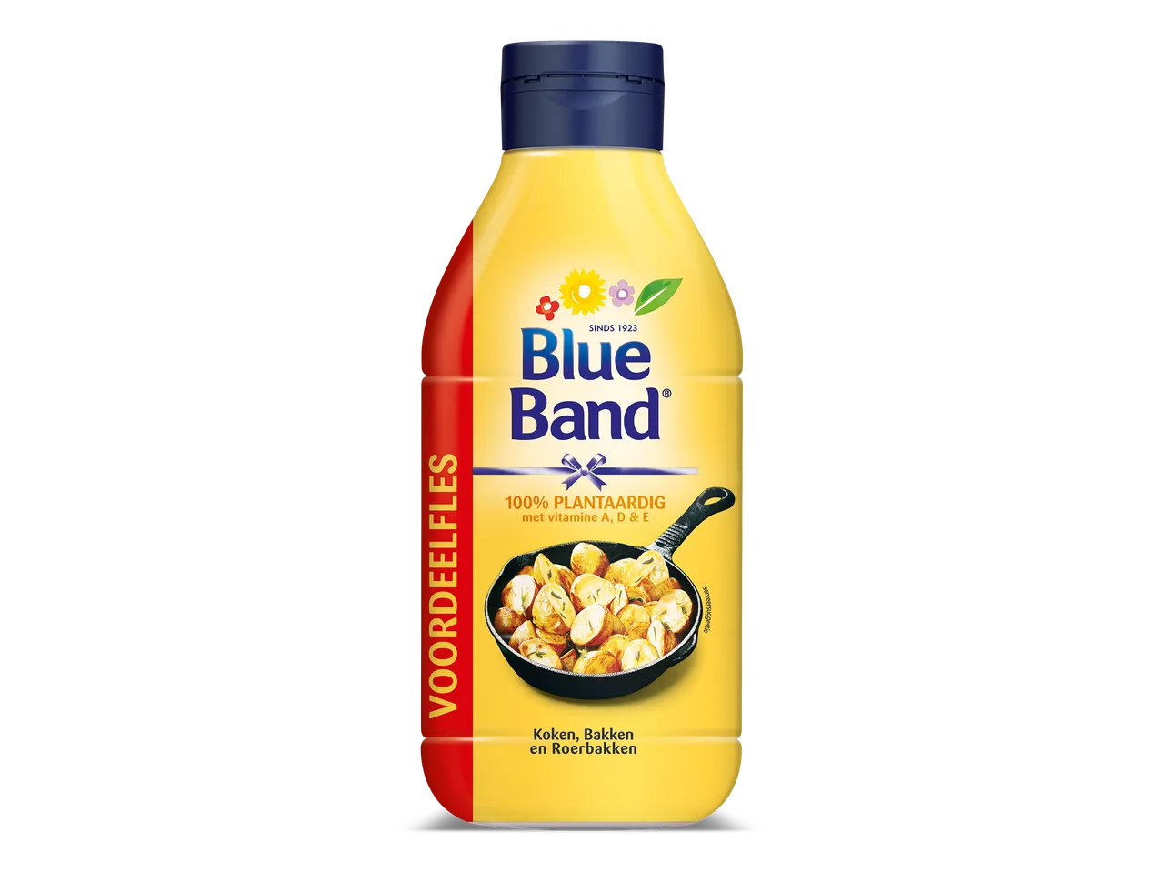 Fles plantaardige bak- en braadproducten met een pan gebakken aardappelen.