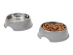 Two grey pet bowls with stainless steel inserts, one empty and one filled with dry food.